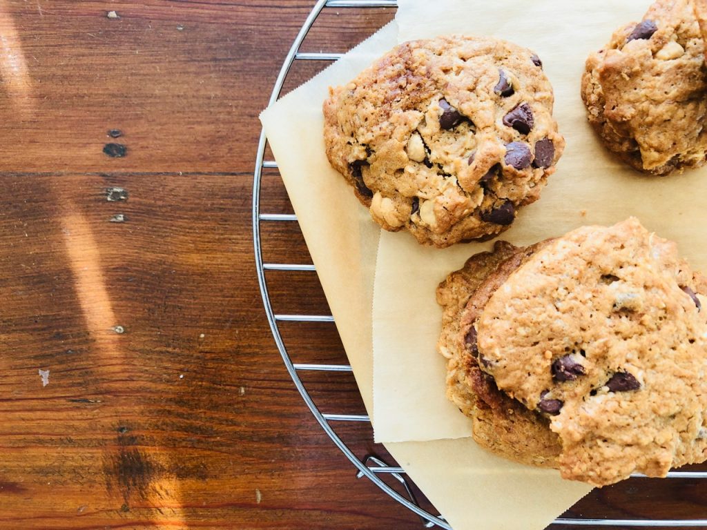 Amish Friendship Bread dump cookies on parchment paper.