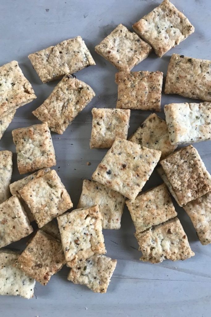 Finished everything bagel crackers on the counter.