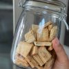 A jar of homemade sourdough crackers.